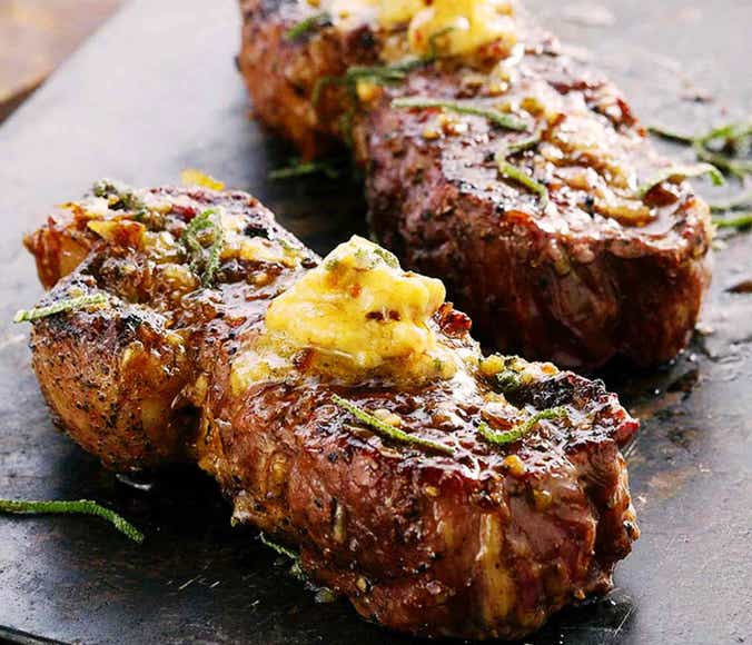 https://www.kingsford.com/wp-content/uploads/2023/05/GRILLED-BUFFALO-STEAKS-WITH-HONEY-DATE-BUTTER-182_cc1_00000000_desktop2x.jpg?quality=50&width=676